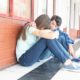 conflict resolution, inclusion, anti-hate and anti-bullying grants; teen comforting other teen at school