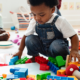 child care policy: young children playing at child care center